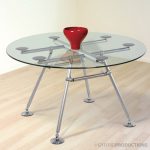 Glass table made with legs made from Gyford hardware