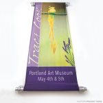 Museum banner mounted to the wall using Gyford Standoffs