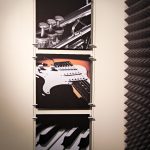 Musical instruments mounted to wall with Gyford Wire System