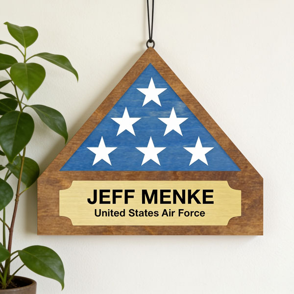triangle shape plaque with stars and a name plaque using colorshop wood mocha and bluejay and flexibrass brushed gold over black