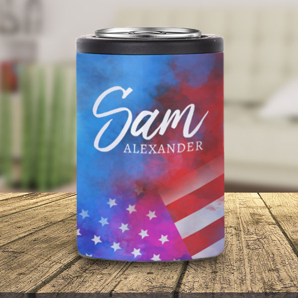 Patriotic background printed on stainless steel can insulator with the name Sam Alexander printed on it sitting on a table