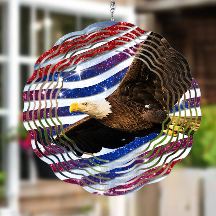 Wind spinner hanging outside with sublimated American flag and eagle on it